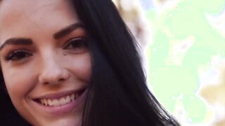 Nubile is spreading her shaved pussy while in the forest