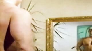 Man with muscles cum while being watched in vintage clip