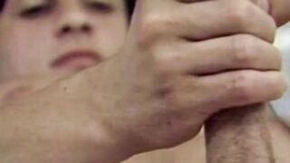 Hunks are stroking their cocks together in vintage video