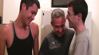 Guy with glasses gets his long cock sucked by two gays