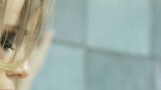 Alexis Adams takes a shower before getting dirty again