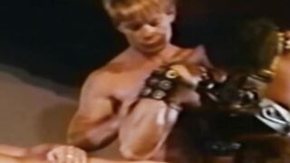 Young man is raw banged by large dicks in retro gangbang