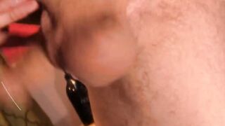 Inked jock massaging his big balls and wanking pierced cock