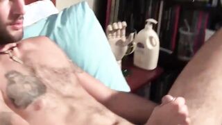 Stunning tattooed gay amateur beating off his enormous cock