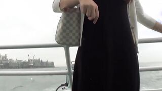 Voluptuous Japanese babe shows her tits and pussy on boat