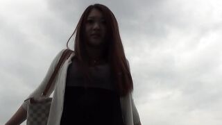 Voluptuous Japanese babe shows her tits and pussy on boat
