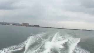 Voluptuous Japanese babe shows her tits and pussy on boat