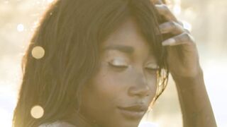 Petite black teen model posed outdoor