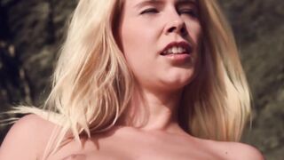 Nubile is teasing as she presents her shaved pussy outdoors