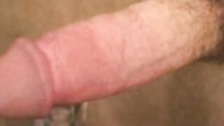 Muscular older guy shows off cock before rubbing it
