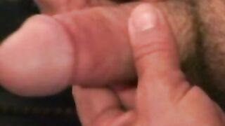Muscular older guy shows off cock before rubbing it