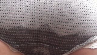 Japanese schoolgirl soaks her panties up at a rainy day