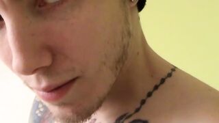 Tattooed straight thug plays with his small cock and cums