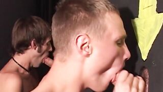 Handsome guys gets on their knees and suck cocks behind a cover