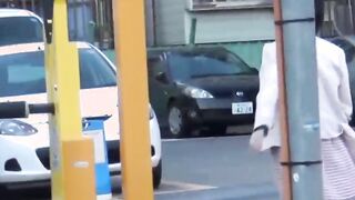 Classy Japanese redhead finds a secret place to pee