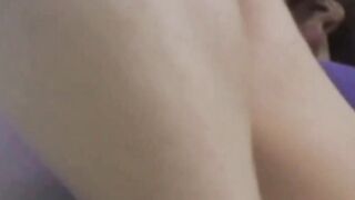 Young Japanese lady fingering her pussy while being filmed