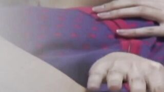 Young Japanese lady fingering her pussy while being filmed