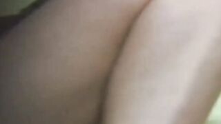 Young Japanese lady fingering her pussy while being filmed