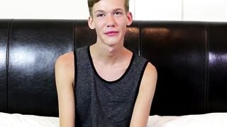 Skinny twink wanks his long cock until he explodes his jizz