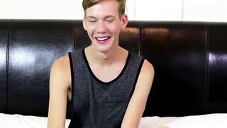 Skinny twink wanks his long cock until he explodes his jizz