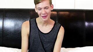 Skinny twink wanks his long cock until he explodes his jizz