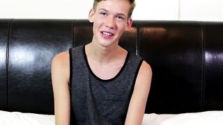Skinny twink wanks his long cock until he explodes his jizz