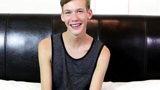 Skinny twink wanks his long cock until he explodes his jizz