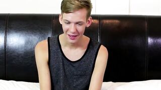 Skinny twink wanks his long cock until he explodes his jizz