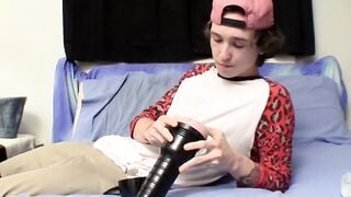 Young amateur works on his big cock and makes it squirt jizz