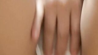 Japanese schoolgirl playing with her hairy pussy