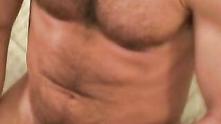 Hairy geezer plays around with his dick and sprays jizz