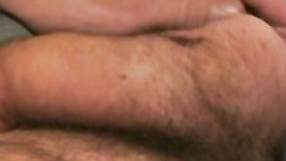 Hairy geezer plays around with his dick and sprays jizz