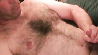 This dudes hairy chest is in your face while he jerks off