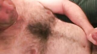 This dudes hairy chest is in your face while he jerks off