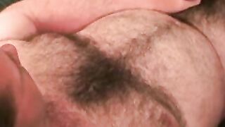 This dudes hairy chest is in your face while he jerks off