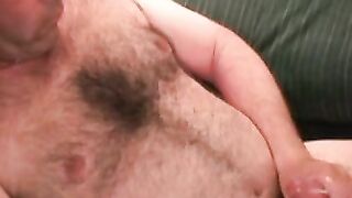 This dudes hairy chest is in your face while he jerks off