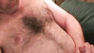 This dudes hairy chest is in your face while he jerks off