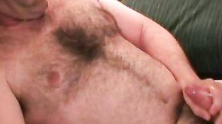 This dudes hairy chest is in your face while he jerks off