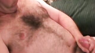 This dudes hairy chest is in your face while he jerks off
