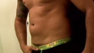 Inked buff gay from Brazil jerks off rough while showering