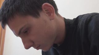 Enticing guy uses two sneakers to masturbate his big dong