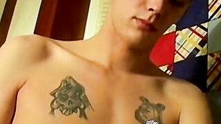 Tattooed twink Cane cums in mutual handjob with lover Blinx