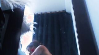 Ebony teen fucks stuck dildo on the wall on webcam