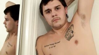 Tattooed straight dude shows his hard cock while masturbating