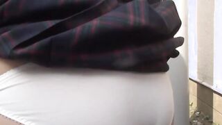 Japanese schoolgirl being naughty and peeing in public