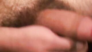 Handsome gay man stroking big cock before cumshot