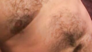 Handsome gay man stroking big cock before cumshot