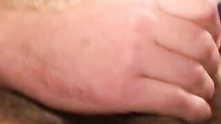 Handsome gay man stroking big cock before cumshot