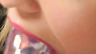 Blonde babe rides massive dildo while rubbing her clit