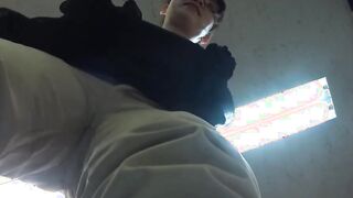 Japanese babe pisses while wearing her pants